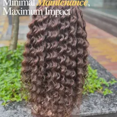 Minimal maintenance, maximum impact. This curly wig is perfect for those who want a stunning look without spending hours on styling.
