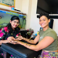 Here I am with my client from Switzerland. It's always an honor to introduce someone to the art of mehandi and share a piece of our culture with them.