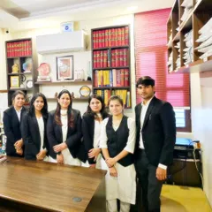 Another photo of my team in our office. Having a group of bright, dedicated young advocates ensures we can provide thorough and attentive service to all our clients.