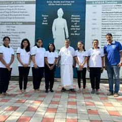 With fellow practitioners at an S-VYASA (Swami Vivekananda Yoga Anusandhana Samsthana) event. My teaching is grounded in the principles of traditional yoga institutions, combining ancient wisdom with a scientific approach.
