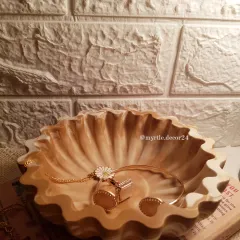 We created this beautiful floral bowl with a unique "Mocha Mousse" marbled effect. The wavy, petal-like edges make it a stunning centerpiece or a catch-all bowl for your entryway.