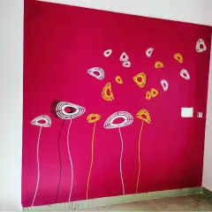 A playful abstract floral mural on a bright magenta wall. This design uses simple lines and shapes to create a modern and cheerful atmosphere.