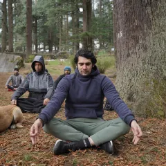 After the grind, we find our peace. Here I am leading a meditation session in the quiet of the Manali forest, with one of our local four-legged friends joining in. Training the mind is just as important as training the body.