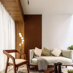An identical shot of the living room, emphasizing the clean lines and thoughtful decor. This consistency is key for architectural portfolios and real estate listings.