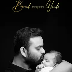 A bond beyond words. This powerful black and white portrait of a father kissing his newborn's head is a timeless and emotional keepsake from those precious early days.