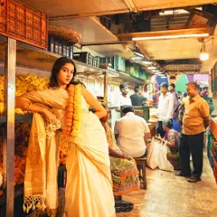I love the contrast of high fashion in everyday places. Here, we created a striking editorial moment with a traditional saree amidst the beautiful chaos of a Mumbai flower market.