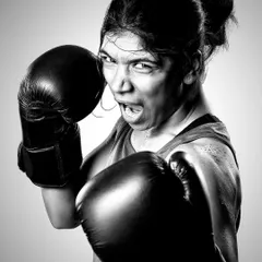 The raw energy of boxer Nikhat Zareen for a Thums Up campaign. This black and white action shot is all about capturing her fierce determination and power, freezing a moment of intense focus.