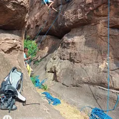 A typical scene at the base of the crag in Badami. Here you can see climbers gearing up, with ropes and equipment ready for a day of learning, practice, and sending routes.