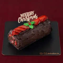 Our Traditional Chocolate Strawberry Yule Log is a festive masterpiece. It's decorated with fresh strawberries and a "Merry Christmas" topper, ready to be the star of your dessert table.