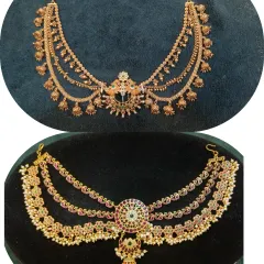 A look at two different styles of hair accessories. One is a classic temple design and the other is a kempu stone piece, both perfect for adorning a bridal braid.