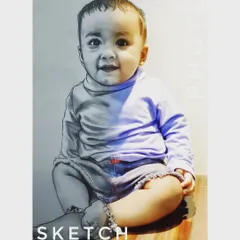 A creative piece combining the original photo with my sketch. This shows how I can transform a colorful picture of a child into a timeless black and white drawing.