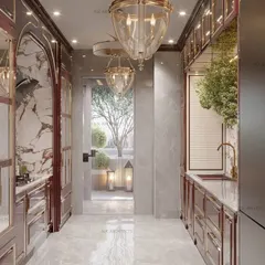 We transformed this culinary space into a masterpiece with a stunning maroon color palette. The classical design, featuring an arched cooking niche and book-matched marble, brings a timeless charm that is both functional and stylish.