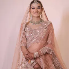 Effortlessly gorgeous portraits of my bride in her pastel lehenga. The makeup is soft and minimal, letting her natural beauty and happy smile be the focus.