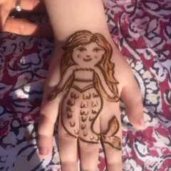 A magical mermaid design for a little girl. Kids' henna is all about fun and imagination.
