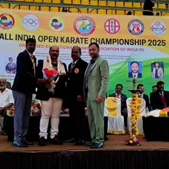 Being felicitated at the National Karate Championship in Mysore. It is an honor to be recognized by the wider martial arts community, a reflection of our federation's contribution to karate in India.