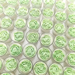 A sea of green peony votive candles, part of the large Teacher's Day order, showing my ability to execute large, color-specific requests.