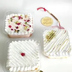 My signature Tres Leches tubs are a true comfort dessert, and here you can see the full range of my fusion flavors. I offer the Classic, a rich Rasmalai version with pista and saffron, and a fragrant Rose flavor that tastes just like falooda.