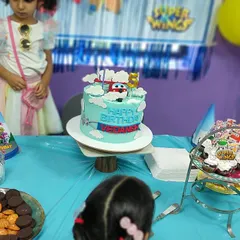 A close-up of the incredible Super Wings birthday cake for Vedansh. We provide the perfect spot to display your themed cake and treats.