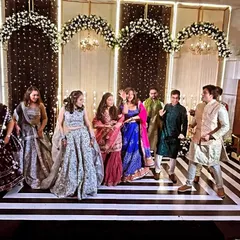 A fun dance-off between the girls and boys. These group performances are a great way to get everyone involved and add some friendly competition to the sangeet.