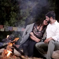 Our outdoor campfire setup is perfect for capturing cozy, romantic moments at night. The warm glow of the fire and the rustic seating create an intimate atmosphere for your couple's photoshoot.