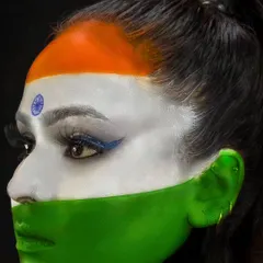 Wishing everyone a happy Independence Day with this patriotic face paint, showcasing the tricolor with pride and precision.