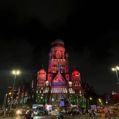 The BMC building illuminated with a projection mapping display for Independence Day. My night photography specializes in capturing these large-scale light shows.