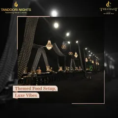 For this event, we created a themed food setup with luxe, dramatic black draping and chandeliers. We believe the ambiance of the dining area should be as spectacular as the food itself.