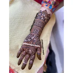 This traditional Indian design is filled with auspicious elephant motifs. Elephants symbolize good luck and prosperity, making them a popular choice for bridal mehndi.