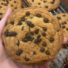 You can never go wrong with a classic. This is our signature choco-chip cookie, perfectly baked to be soft and chewy, and absolutely packed with chocolate chips in every single bite.