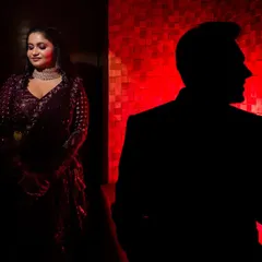 Using shadow and a single source of red light to create a dramatic and mysterious portrait. This is for couples who want something bold and different.