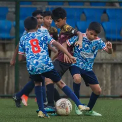 The fight for every ball. This is the passion and determination we instill in our players during every youth football match. It's about giving your all for the team and the badge.