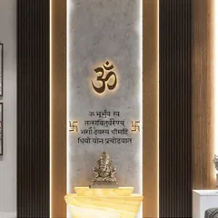 This contemporary mandir design uses a combination of concrete-finish panels and dark wood fluting. The illuminated Gayatri Mantra adds a sacred and powerful touch.