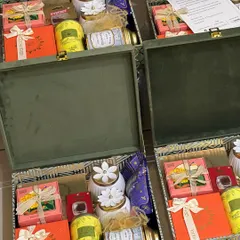 Getting a large corporate order ready for Diwali. These green velvet trunk boxes are filled with a curated selection of premium teas, sweets, and decorative jars, ensuring every employee feels valued.
