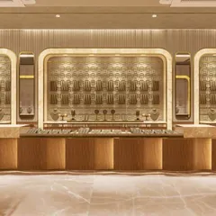 A 3D render of a luxury jewellery showroom we designed, showcasing how we create an atmosphere of opulence and elegance. The design uses soft lighting and intricate back panels to ensure the jewellery remains the star of the show.