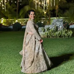 Another shot of our client looking radiant in her rented lehenga, proving that style doesn't need a heavy price tag.