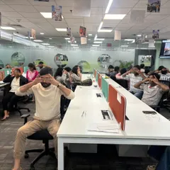 To combat digital eye strain, I incorporate gentle eye exercises into my desk yoga sessions. Here, the team at MagicBricks is practicing palming to rest and rejuvenate their eyes.