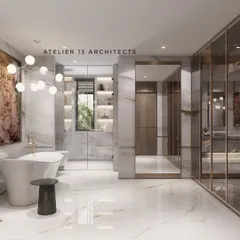 This master bathroom combines opulence and function with floor-to-ceiling white marble and a freestanding bathtub set against a dramatic piece of art. The adjoining walk-in closet features glass and bronze-trim doors, offering a seamless transition from personal care to bespoke storage.