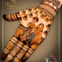 A special design created for the Rajasthani festival of Gangaur. It features a couple in traditional attire, celebrating the goddess Gauri.