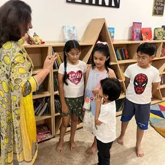 An instructor tells the story of Lord Ganesha during our Ganesh Chaturthi celebrations. The children listen with rapt attention.