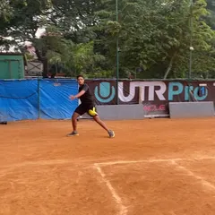 A player warming up his groundstrokes before a match. Proper preparation is key to performing your best, and our courts are the perfect place to get in the zone.