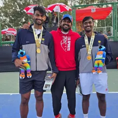 Our founder Suraj Bikkannavar with two players from the Bronze medal-winning Karnataka Tennis Team at the 38th National Games. A proud moment for the state and our academy.