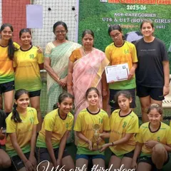 The Shishuvan U16 girls' team proudly accepts their third-place trophy at the Inter-School Football League, a testament to their grit and our coaching.