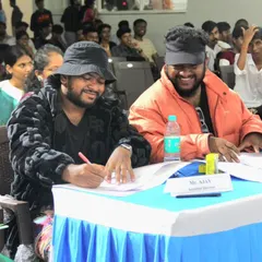Sharing a lighter moment at the judge's table during a college event. While I take the scoring seriously, I also believe in creating a positive and encouraging atmosphere for the participants 💫