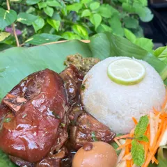 Our weekend special, Sweet Pork Knuckles. The meat is slow-cooked until it's fall-off-the-bone tender, served with sticky rice, a hard-boiled egg, and a fresh salad chutney.