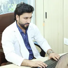 Behind every successful treatment is hours of research and planning. Here I am at my desk, ensuring every client's treatment plan is perfectly tailored to their needs.