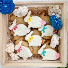 Our adorable Easter Bunny Cookies are a festive treat for the holiday. These shortbread cookies are dipped in white chocolate and decorated with colorful sprinkles.