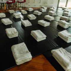 The mats are ready. Our studio is a space of order, cleanliness, and potential, prepared for students to begin their practice with a clear mind.