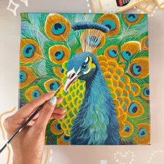 Here, I'm adding the final touches to a vibrant peacock portrait. This flat-lay view shows the rich texture of the canvas and the bright acrylic paints I use to bring the bird's character to life.