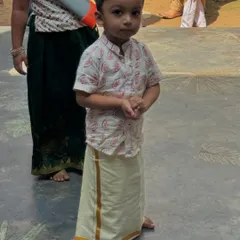 Another one of our littles in traditional attire, ready to celebrate. These events are a wonderful opportunity to learn about the different textiles, languages, and customs of our country.
