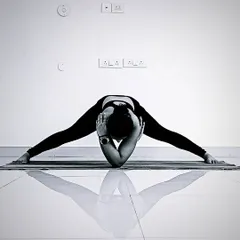 Finding stillness in Prasarita Padottanasana, or Wide-Legged Forward Fold. This pose stretches the hamstrings and inner thighs while calming the mind. It’s a wonderful way to turn inward and let go.